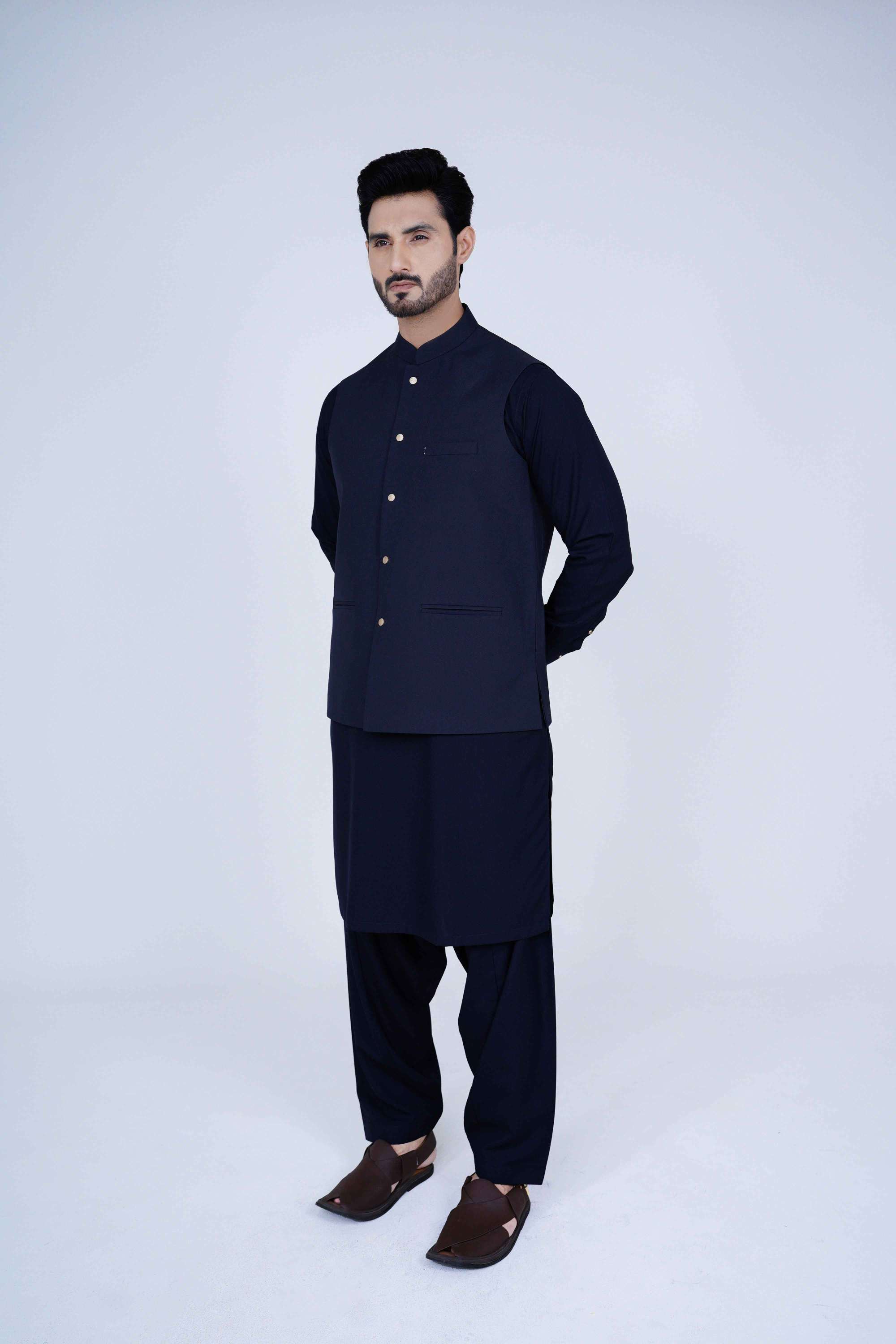 Stitched suiting fabric waist coat in navy blue, crafted with imported blended fabric and elegant tailored details.