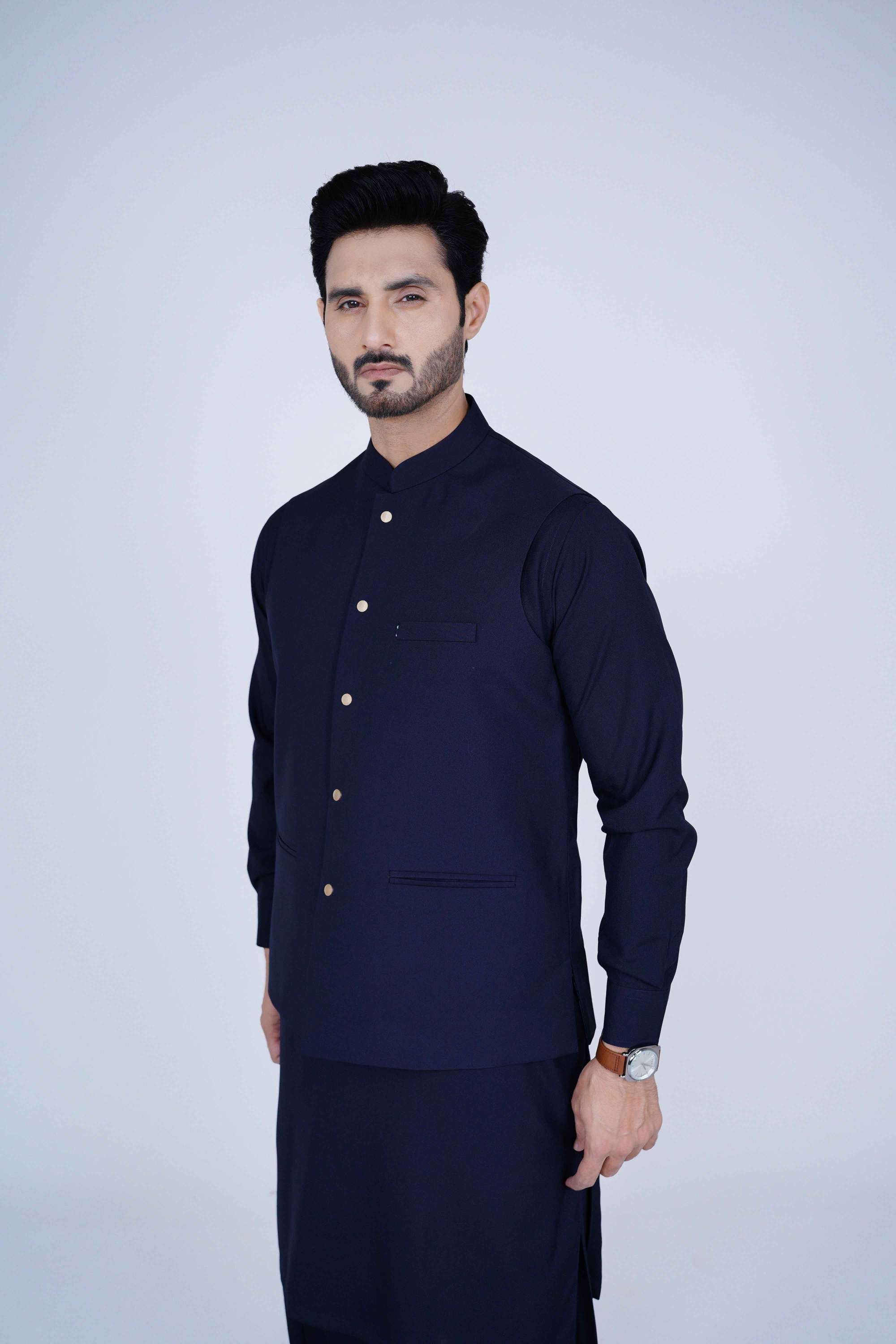Stitched suiting fabric waist coat in navy blue, crafted with imported blended fabric and elegant tailored details.