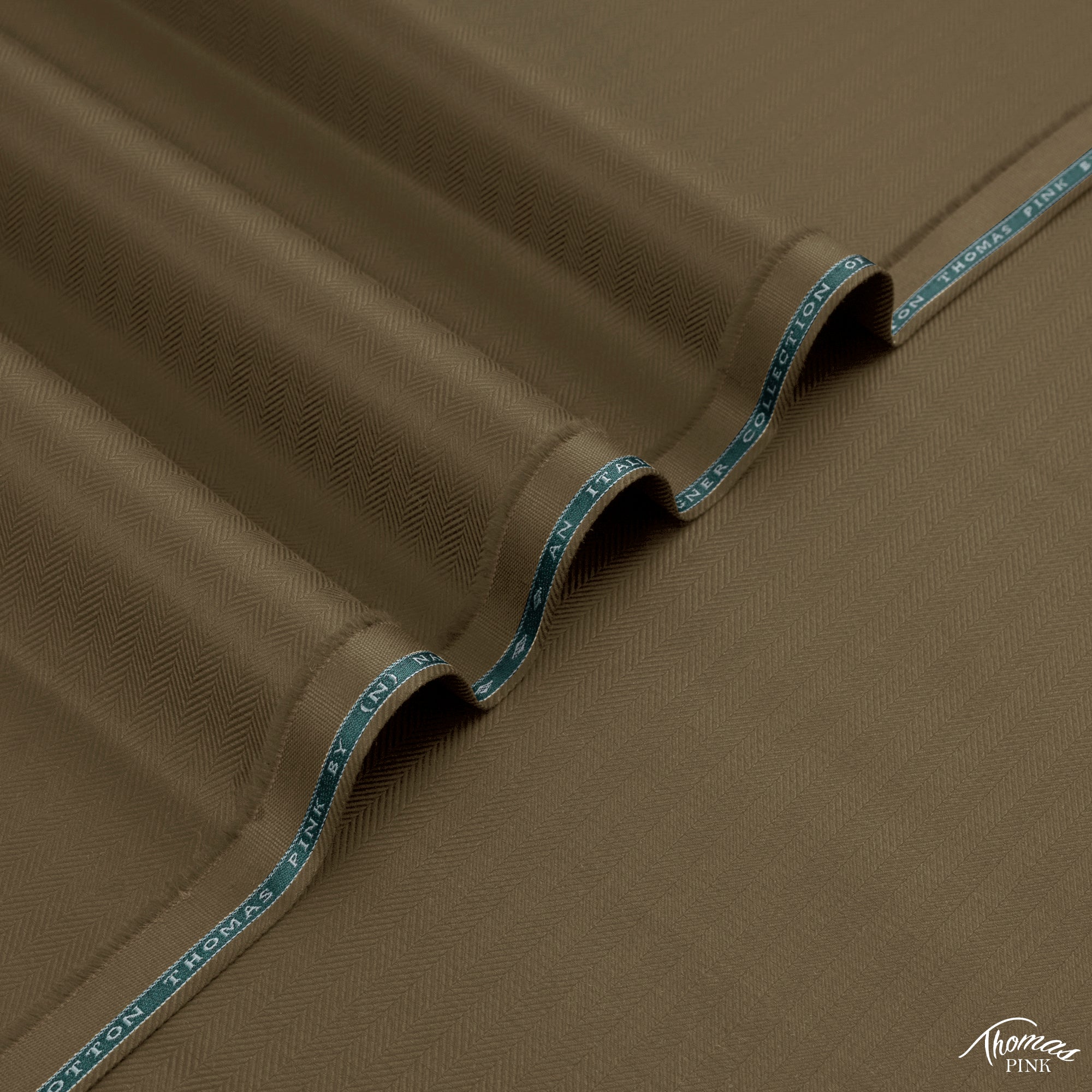 Thomas Pink unstitched winter fabric in 100% cotton with herringbone texture, soft touch, and rich winter colors by Narkin’s.