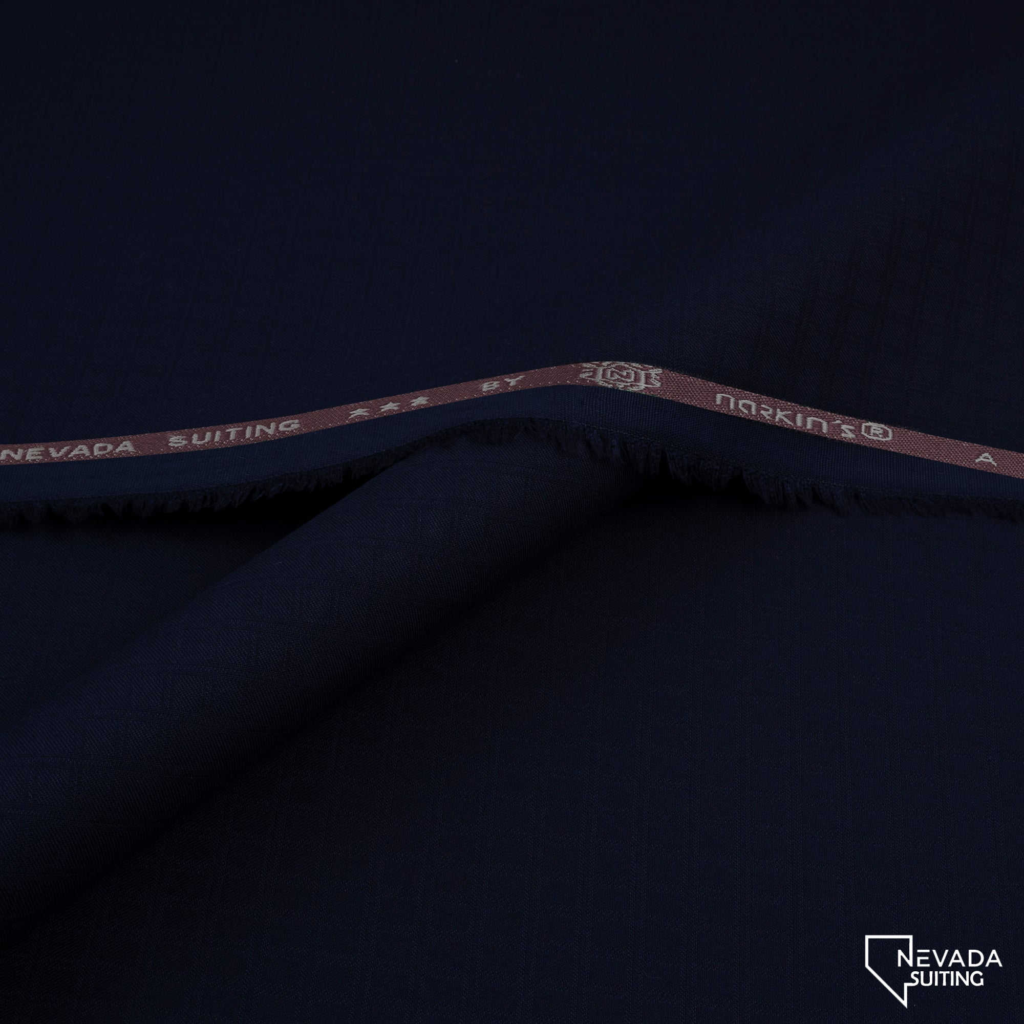 "Nevada Suiting unstitched winter fabric by Narkin's with wrinkle-free texture, medium weight, and soft finish