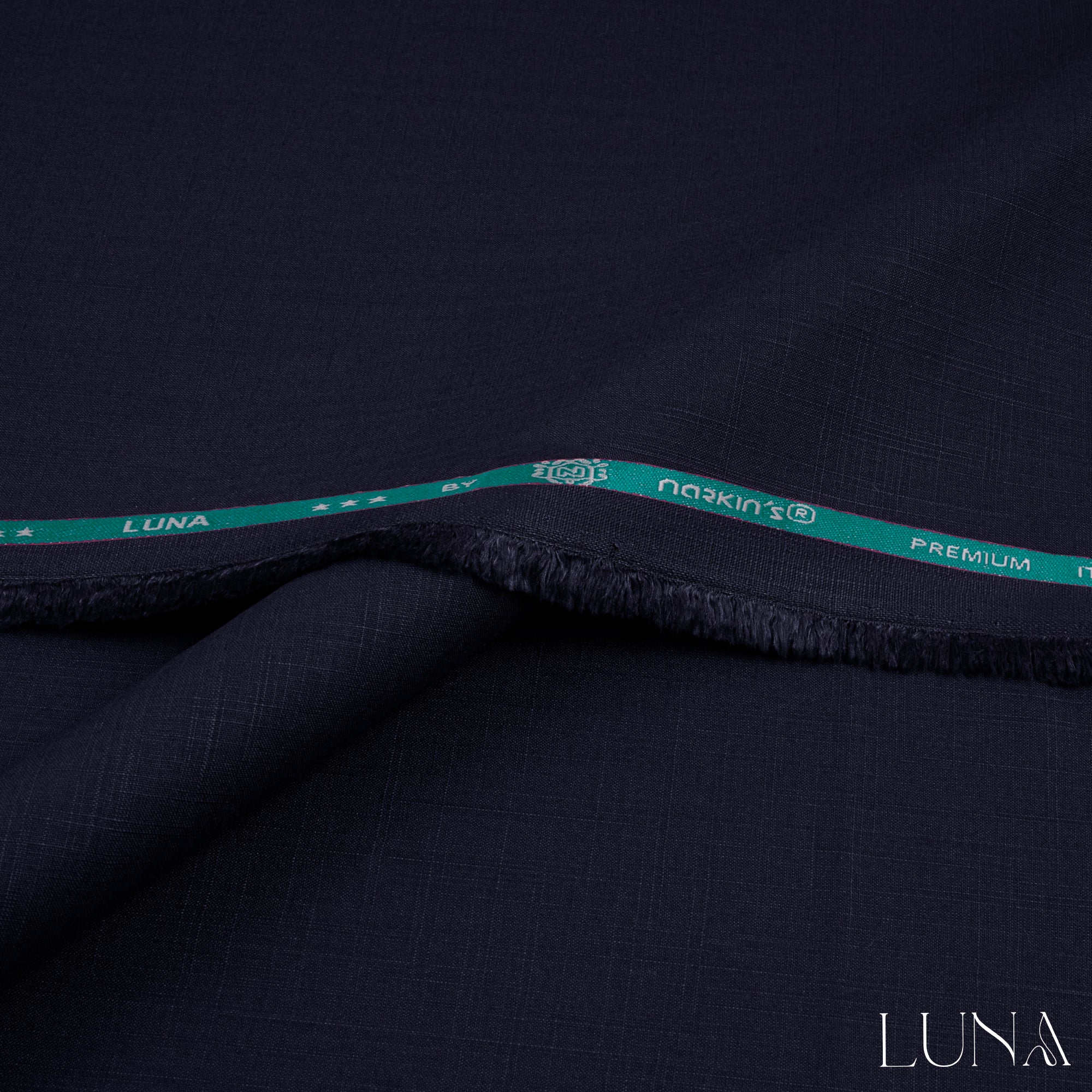 una unstitched winter wash & wear fabric with textured slubby finish in elegant winter colors