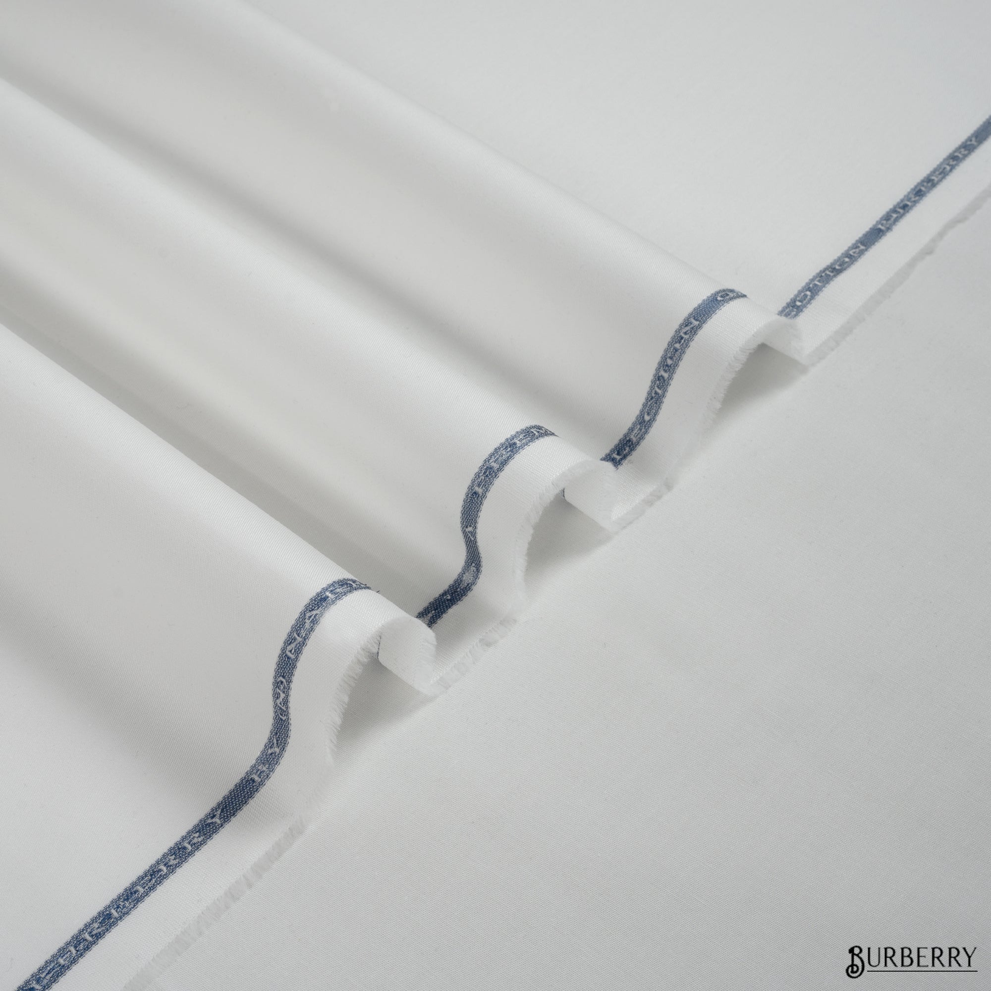 Burberry 2 unstitched winter fabric in 100% cotton with soft luxurious feel, perfect for party and casual winter wear
