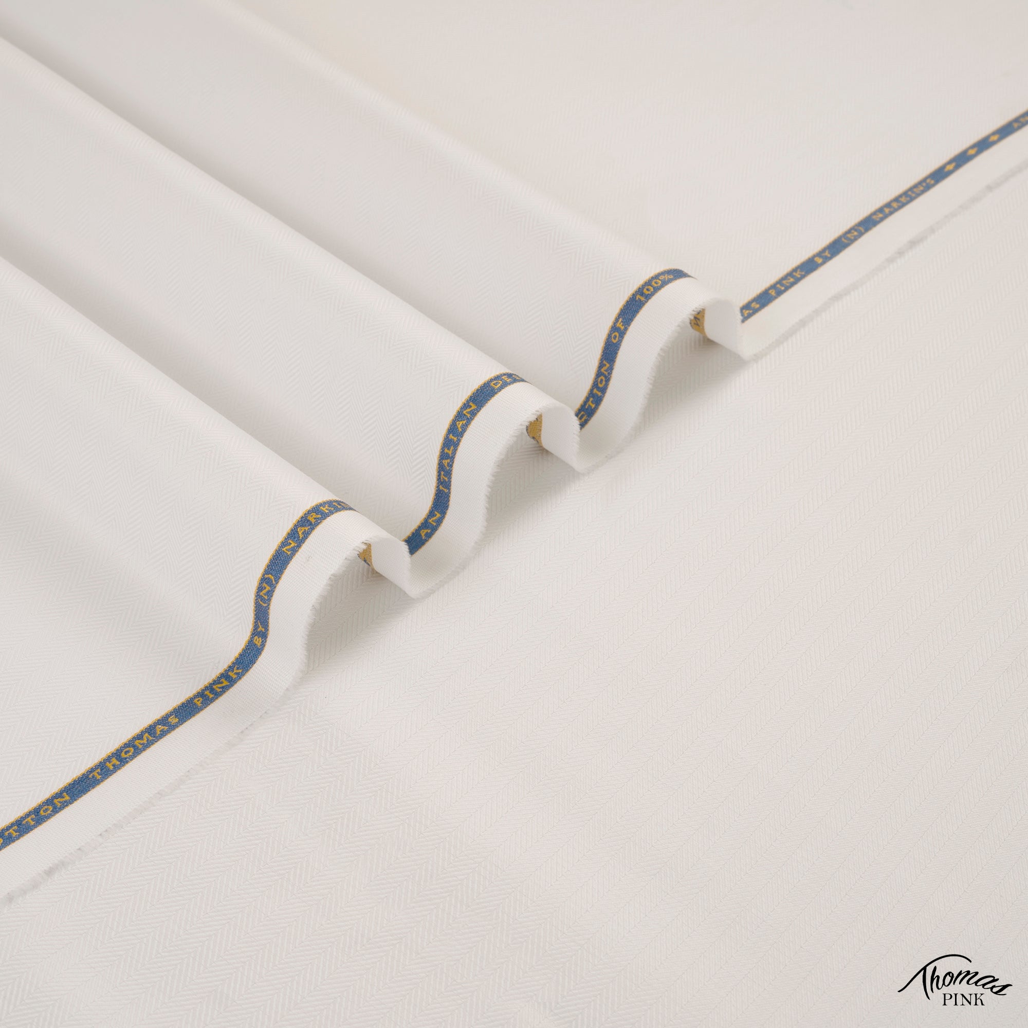 Thomas Pink unstitched winter fabric in 100% cotton with herringbone texture, soft touch, and rich winter colors by Narkin’s.