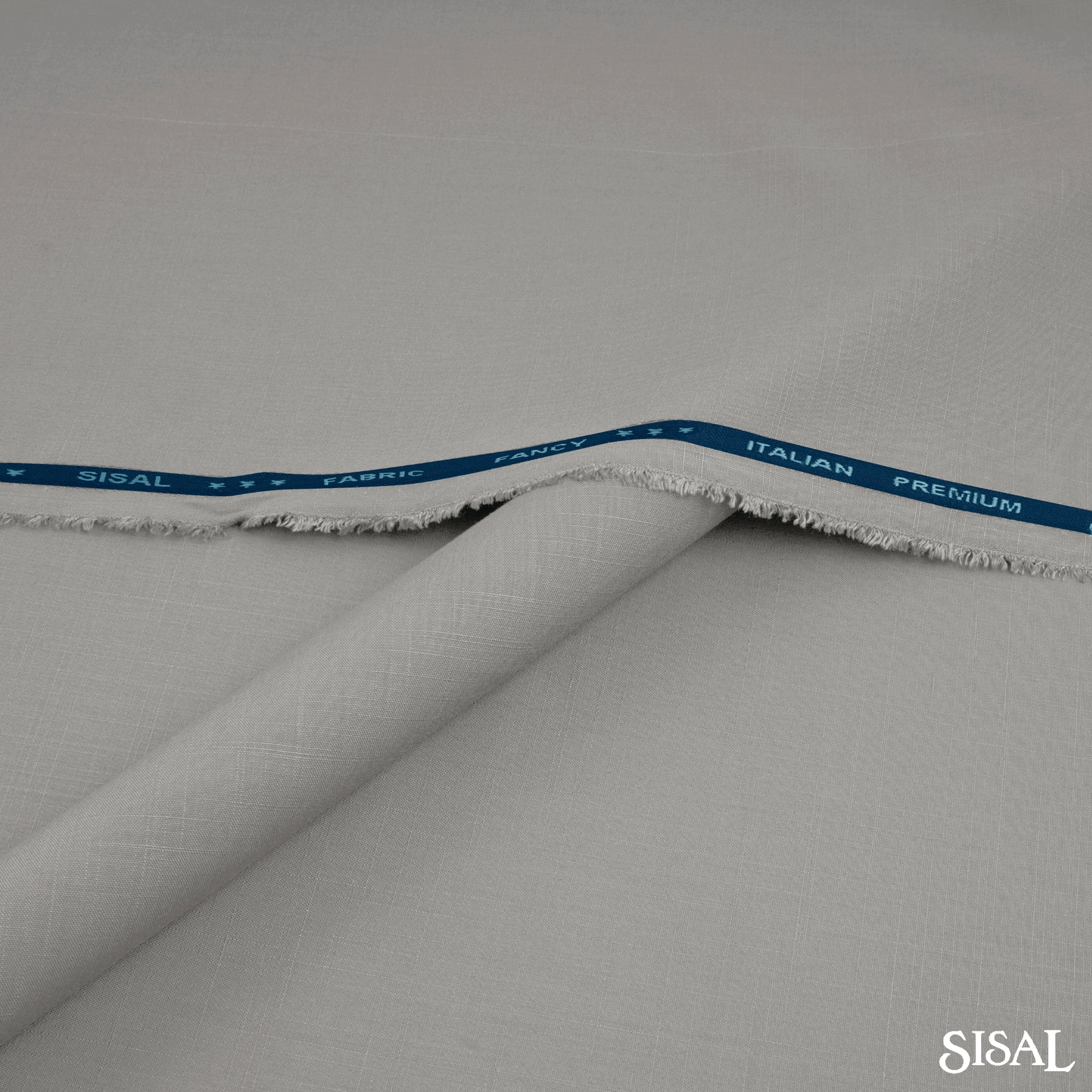 "Sisal unstitched winter wash & wear fabric by Narkin’s with soft texture and luxurious drape, perfect for parties and formal wear"