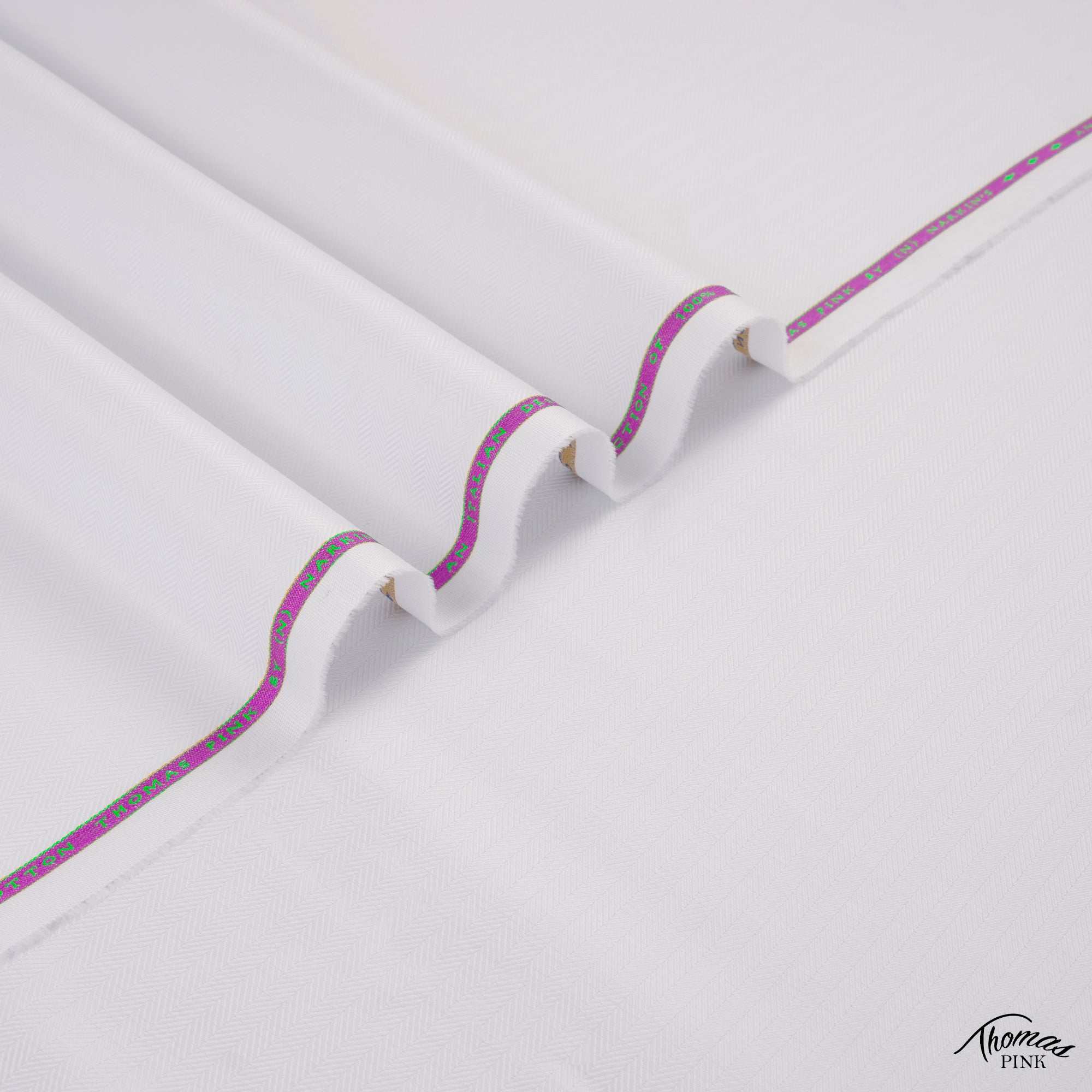 Thomas Pink unstitched winter fabric in 100% cotton with herringbone texture, soft touch, and rich winter colors by Narkin’s.