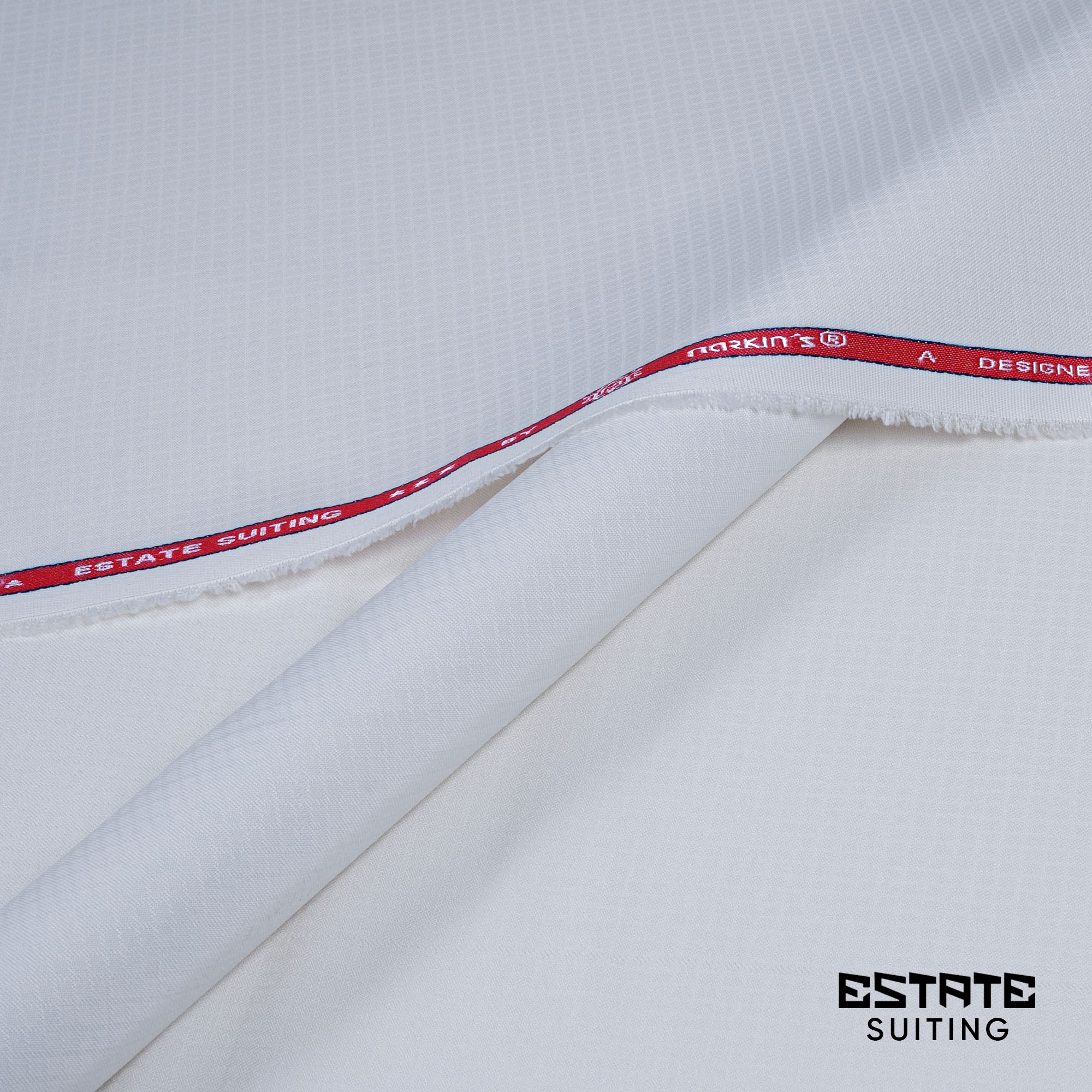 Estate unstitched suiting fabric by Narkin’s, winter wash & wear, medium weight, wrinkle-free with subtle textured weave