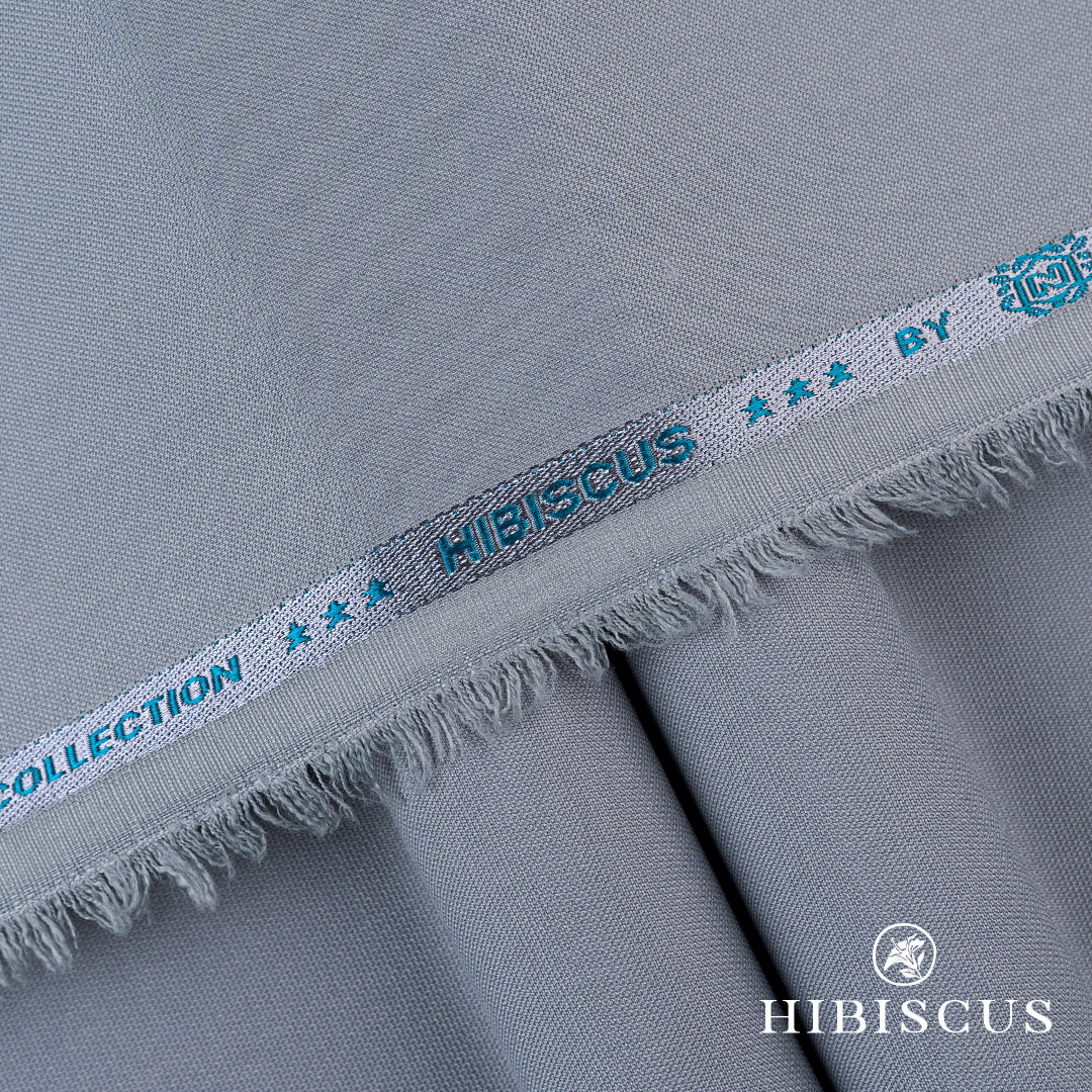 "Hibiscus unstitched winter wash & wear fabric with textured dobby weave and soft luxurious feel"