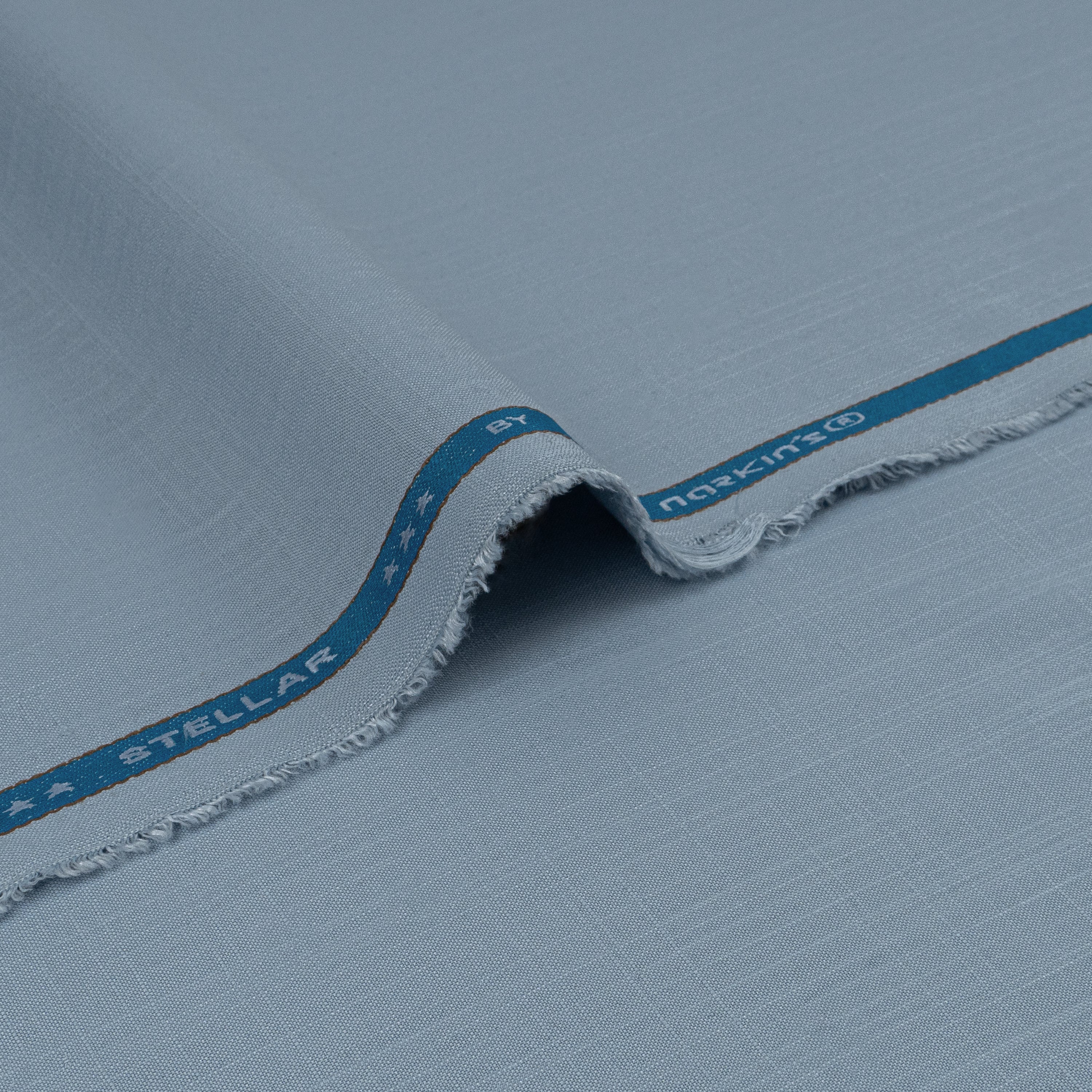 Stellar unstitched winter wash & wear fabric by Narkin's in rich colors with linen-inspired texture, wrinkle-free and soft for formal and outdoor wear.