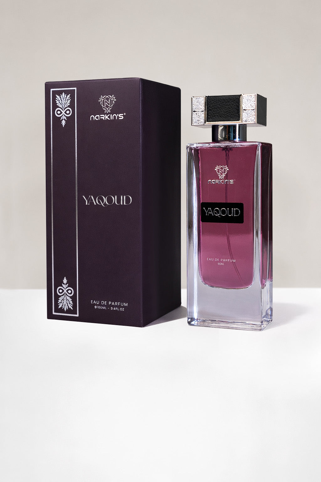 YAQOUD perfume bottle – luxury oud fragrance with orange, saffron, and pink pepper notes