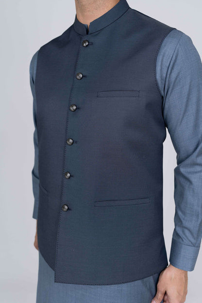 Stitched suiting fabric waist coat in blue, crafted with imported blended fabric and elegant tailored details.
