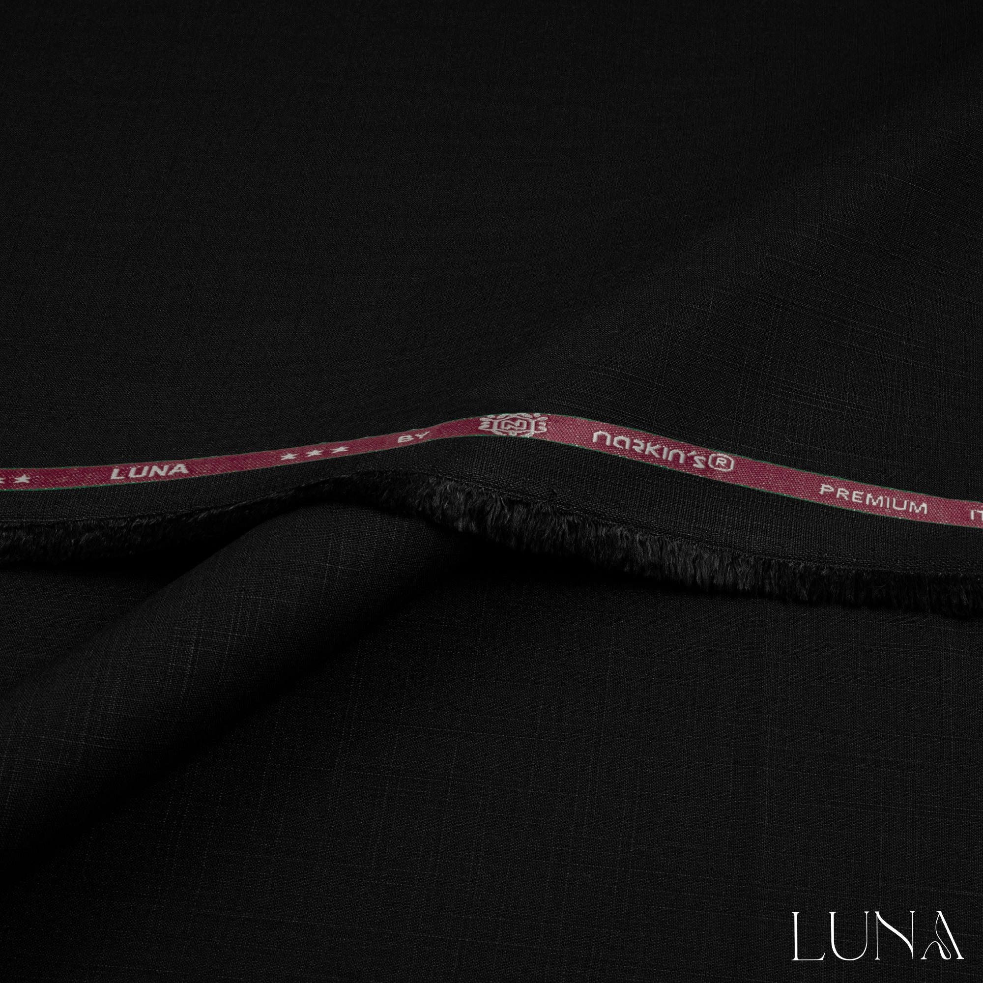 una unstitched winter wash & wear fabric with textured slubby finish in elegant winter colors