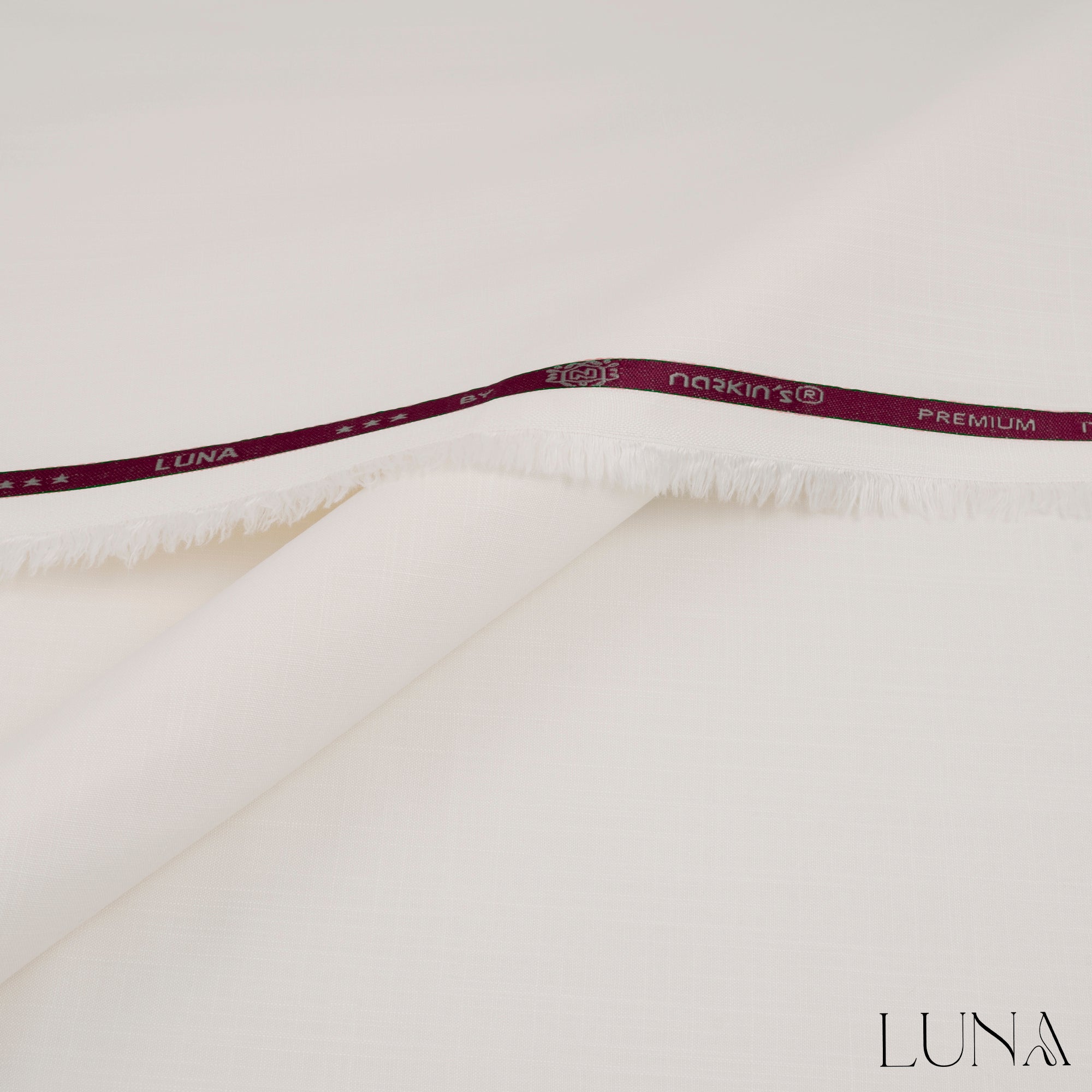 una unstitched winter wash & wear fabric with textured slubby finish in elegant winter colors