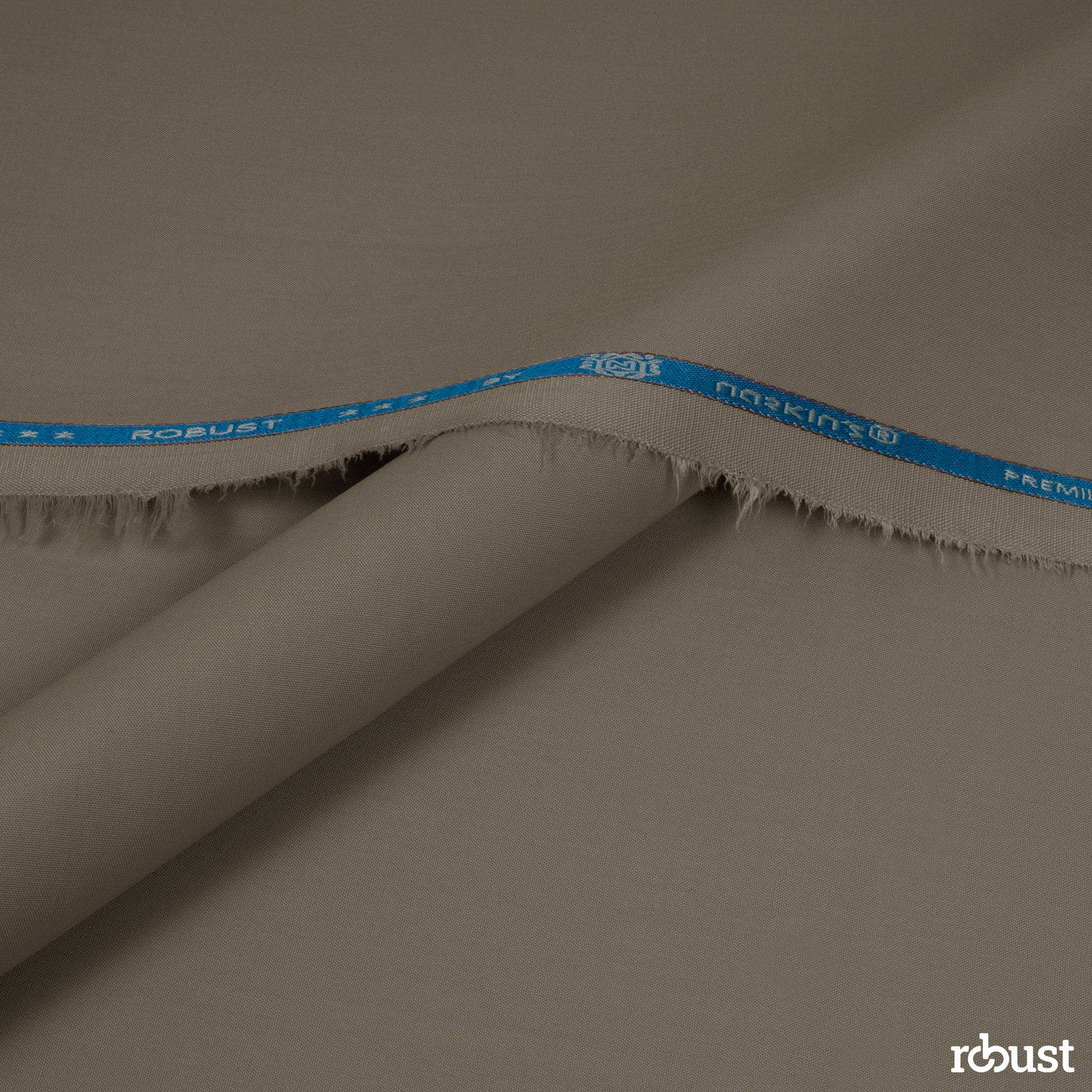 Robust unstitched winter wash & wear suiting fabric with woolen feel, perfect for tailored outfits and seasonal comfort.