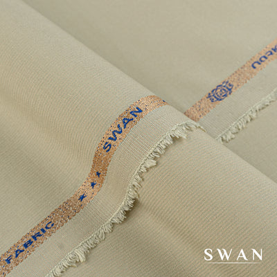 Swan unstitched winter fabric with soft feel and self-textured design, perfect for elegant day and evening wear.