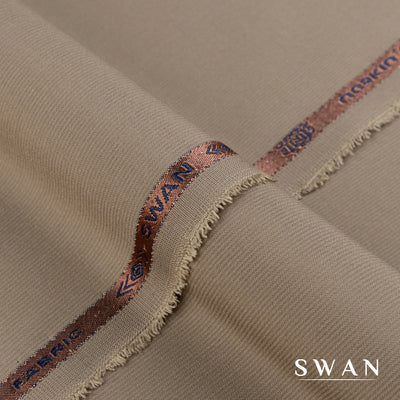 Swan unstitched winter fabric with soft feel and self-textured design, perfect for elegant day and evening wear.