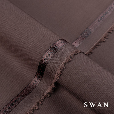 Swan unstitched winter fabric with soft feel and self-textured design, perfect for elegant day and evening wear.