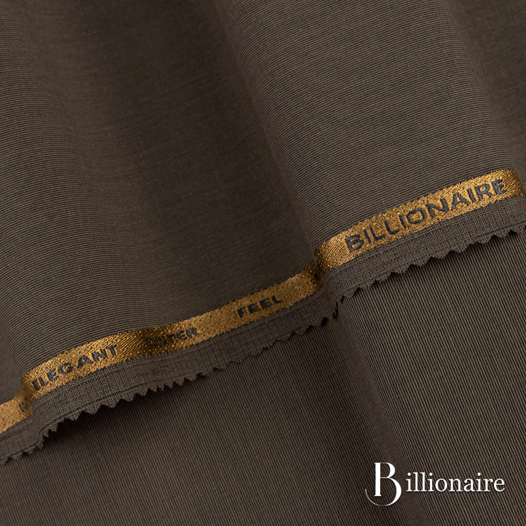 Billionaire unstitched fabric with subtle texture and lustrous finish, perfect for winter wash & wear and festive or party occasions