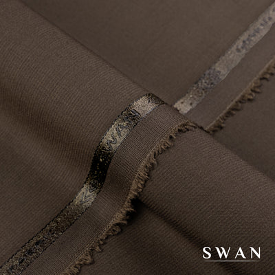 Swan unstitched winter fabric with soft feel and self-textured design, perfect for elegant day and evening wear.