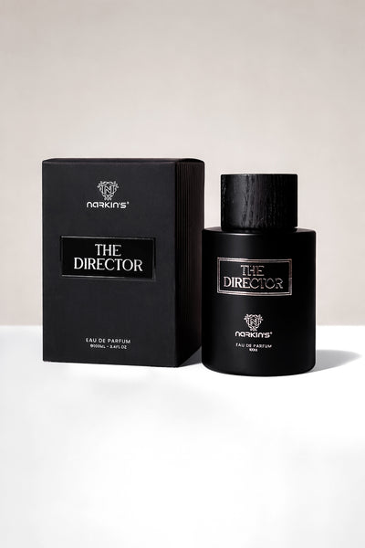 The Director perfume bottle – luxury woody, floral, and musky fragrance with Ambroxan, Bergamot, Orris Root, and Patchouli
