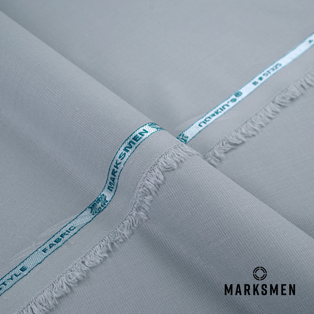 Marksmen unstitched winter wash & wear textured fabric with soft, lustrous finish and wrinkle-resistant construction.